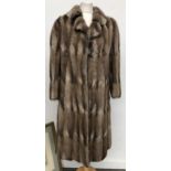 A Peltmoden Wilmsmeyer ladies fur coat, size 10-12