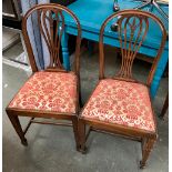 A pair of 19th century mahogany dining chairs, wheat sheath splats over drop in seats