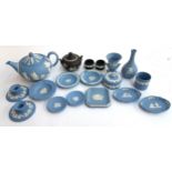 A quantity of Wedgwood Jasper ware to include teapot, candlestick holders, bottle vase, trinket pot,