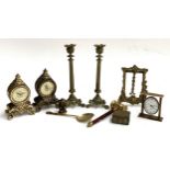 A small lot of brass items to include a air of candlesticks, gavel, photo frame, Aesthetic