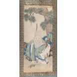 A large Japanese painted kakejiku hanging scroll depicting the god Jurojin with a deer, 124x55cm,