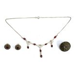 A pretty 925 silver necklace set with red stones, together with a pair of sterling silver Celtic