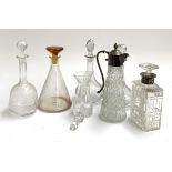 A small lot of cut glass and other decanters, to include a conical flask decanter, a pair etched