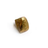 A gold tooth, total weight approx. 1.3g