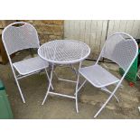 A Ketler garden table and folding chairs