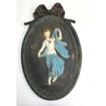 A cast iron and painted plaque of a lady in the Classical style, 51x32cm