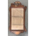 A 19th century mahogany and parcel gilt hoho mirror (AF)