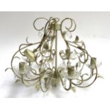 A wrought metal candelabra, with cut glass drops, approx. 57cmD