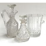 A heavy lead glass ice bucket, 20cmH; together with a pineapple cut Stuart crystal decanter,