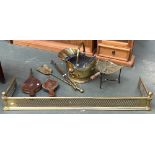 A quantity of fire tools and furniture, to include a pierced brass fire surround, 125cmW; helmet
