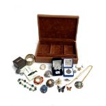 A jewellery box containing costume brooches, to include Sphinx, filigree earrings; Empire made