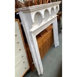 A white painted pine fire surround, 137x145cm