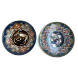 A pair of Oriental cloisonne plates each depicting a phoenix, each 29.5cmD