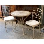 A Kewdos Ltd tile topped circular garden table, 76cmD, with two wrought metal chairs with loose