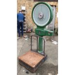 A set of 250kg platform scales by H Pooley, Birmingham, in working order, 190cm high