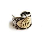 An Italian 925 silver ring with embossed Greek key pattern, with an applied 18ct gold panel