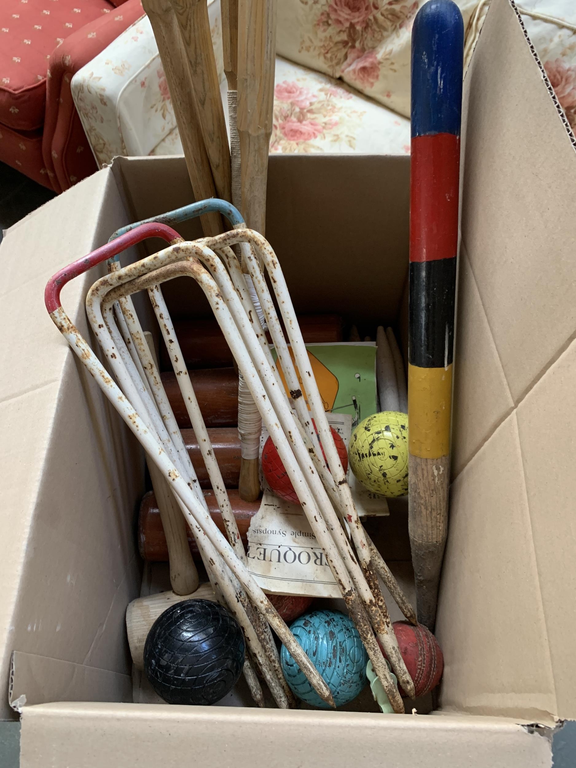 A Jacques croquet set, four mallets (two af), six hoops, pegs