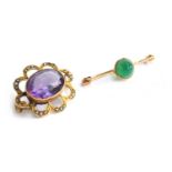 An Edwardian 9ct gold amethyst and seed pearl brooch, 2cm wide, approx. 3.1g; together with a 14ct