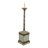 A Neo-classical style painted floor standing lamp in the mid-George III manner, simulated green