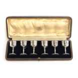 A cased set of six small goblets, by Goldsmiths & Silversmiths Company Ltd., London 1919, each 6.2cm