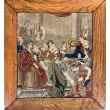 A 19th century Biblical needlework tapestry depicting The Wedding Feast at Cana, in an oak frame, 53