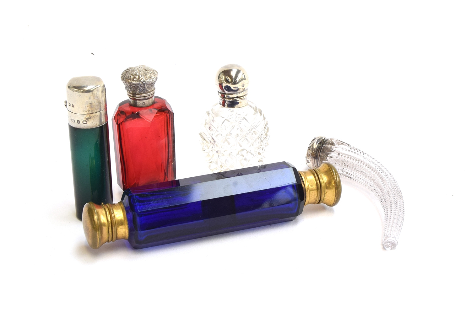 A collection of glass scent bottles to include a faceted cranberry glass scent bottle with chased - Image 2 of 2