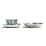 Two Chinese blue and white export porcelain saucers, 11cm diameter and 11.5cm diameter, together