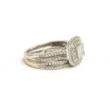 An 18ct white gold Art Deco style ring set with diamonds, size O 1/2, together with a matching