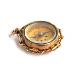 A 9ct gold compass fob, the reverse set with carnelian, hallmarked Birmingham, 1901, approx. 10.
