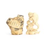 A Japanese ivory okimono in the form of a man being haunted by a youkai, 5cm high; together with a