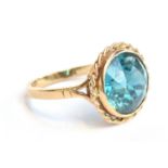 A 9ct gold and blue topaz ring, size Q 1/2, approx. 4.9g