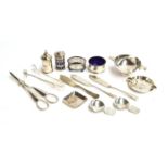 A small lot of silver items, to include a pepper with blue glass liner, by Thomas & Richard
