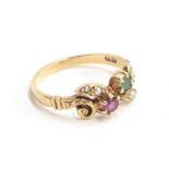 A 9ct gold ring set with an emerald, ruby and seed pearls, size M, approx. 2.2g