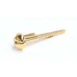 A large 14ct gold tie clip in the form of an oversized screw, 8cm long, approx. 16.2g