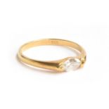 An 18ct gold ring set with a marquise cut diamond, the diamond approx. 7mm long, size K 1/2, approx.