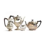 A Victorian three piece silver tea service by James Dixon & Sons Ltd, Sheffield 1892, half fluted,