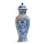 A large Chinese blue and white urn, recovered from a shipwreck, with panels depicting flora and