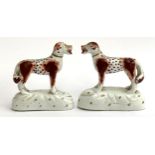 A pair of small 19th century Staffordshire dogs, each 8cmH
