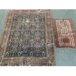 A West Persian rug, 240x190cm; together with a prayer mat, 130x80cm, both af