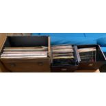 A vinyl carry case containing a number of LPs; together with two further carry cases of 7" singles