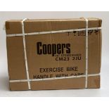 A Coopers of Stortford exercise bike, boxed