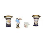 A selection of Meissen porcelain, various dates, comprising: a pair of blue-ground trumpet vases,