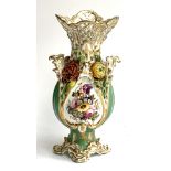 A Coalbrookdale style floral encrusted vase with pierced rim, heightened in gilt with a hand painted