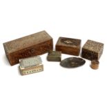 A mixed lot to include several carved wooden boxes, treen pill box, tortoiseshell tray etc