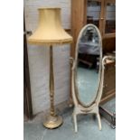 A giltwood standard lamp with shade, 166cmH; together with a white painted oval cheval mirror,