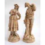 A pair of Rudolstadt porcelain figures of a continental girl and boy in a sepia glaze, each