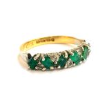 A 22ct gold ring set with emeralds and white stones, approx. 3.9g, size Q 1/2