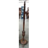 A turned oak standard lamp, 153cmH