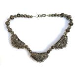 An Eastern white metal necklace, 47.5cm long
