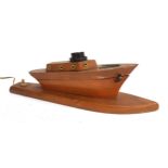 A table lamp in the form of a boat